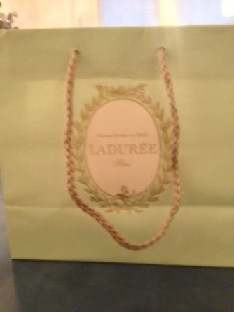The Laduree bag, like the one from Charlotte Olympia, suggests that this is a sumptuous gift rather than “just” a purchase.