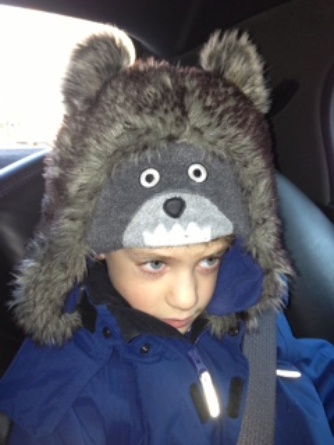 My son’s Yeti hat does more than keep him warm. It renders him appealing, even irresistible (if I may say so myself) to potential caregivers