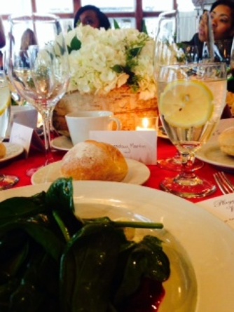 Place settings and floral arrangements convey appreciation to attendees. The bread harkens back to an era when we ate bread.