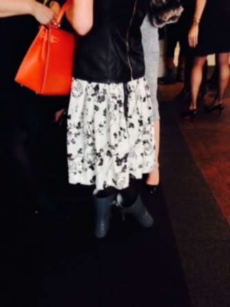 A non-conformist among us: Laura McVey in playful print, leather shirt, rubber boots and Kelly bag.