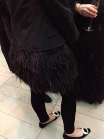 This member of the fashion flock (she looks a lot like the late, great Liz Tilberis) wore some plumage by Dries Van Noten