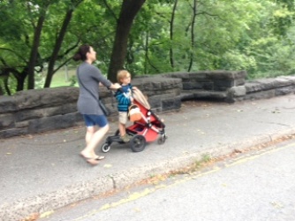 A “standing board” on the stroller allows her to transport older and young kids together. Mothers have always been flexible, resourceful strategists seeking to balance their own well being with that of their children