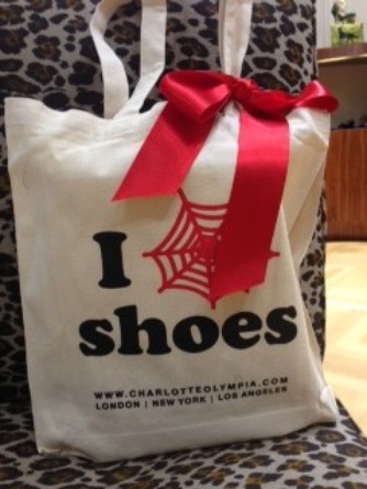A clever riff on the I Heart NY logo. Note the ribbon. The sense is that it’s not a purchase but a “gift.”